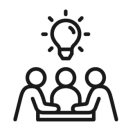People Sitting Around a Table With a Lightbulb Overhead